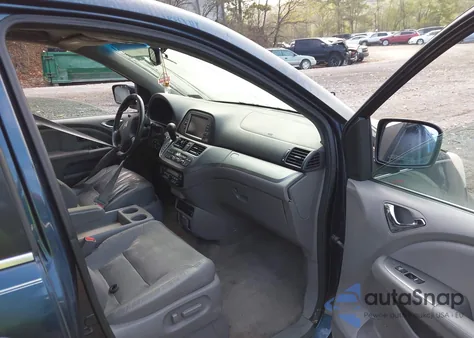 2010 Honda Odyssey Touring z USA, uszkodzony, nr VIN 5FNRL3H99AB058887